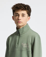 Teen | Kids' Desert 1/4 Mock Zip by Psycho Bunny, featuring a sleek design with an embroidered logo for a modern, stylish look.
