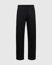 The MENS LYNX WIDE LEG CLASSIC FRENCH TERRY SWEATPANT by Psycho Bunny features black soft French terry fabric, an elastic waistband with drawstring, and a simple straight-leg style. Pictured against a light gray background, they are ideal for casual or athletic wear. SKU: B6P379E200.