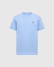 The Psycho Bunny Men's Classic Crew Neck Tee (B6U014B200) in light blue, made from soft Pima cotton, features an embroidered white peace sign hand on the left chest. Set against a grey background, it offers a seamless mix of comfort and style.