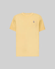 The Psycho Bunny MENS CLASSIC CREW NECK TEE - B6U014F200 is a plain light yellow premium jersey crewneck with a small embroidered bunny logo on the left chest, shown against a gray background.