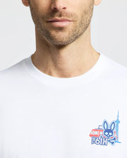 A man wears the Psycho Bunny MENS TORONTO TEE (B6U383F200) in soft Pima cotton, featuring a small cartoon bunny, a red streetcar, the CN Tower, and "The 6ix." Only his lower face and upper torso are visible.