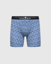 The MENS 2 PACK BOXER BRIEF - B6V481F200 by Psycho Bunny features blue Pima cotton-Modal blend boxer briefs. They ensure all-day comfort with a black waistband displaying the "Psycho Bunny" logo, and have a textured repeating pattern on a light gray background.