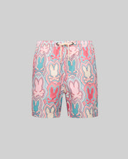 The Psycho Bunny KIDS CHUCK ALL OVER PRINT LIGHTWEIGHT SWIM TRUNK (KB1000002) features a colorful Bunny print in pink, blue, cream, and red on quick-dry recycled fabric with an elastic waistband and white drawstring, shown on a grey background.