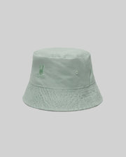 The KIDS CHUCK REVERSIBLE BUCKET HAT - KO1500015 by Psycho Bunny features light green fabric with a small embroidered bunny logo on the front, shown against a plain light grey background.