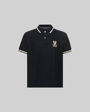 The Psycho Bunny KIDS WADE PIQUE POLO (KT0100032) is a black Pima cotton polo with colorblock tipping on the collar and sleeves, plus an embroidered cartoon rabbit logo on the left chest, shown on a light gray background.