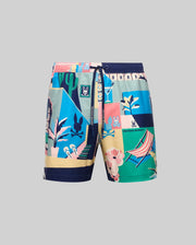 The Psycho Bunny MENS BLAISE SWIM TRUNK (MB1000028) features playful abstract graphics—plants, cacti, flowers, a lounge chair, and bunny logos—on gray fabric. Includes a drawstring waistband and a waterproof bag for convenience.
