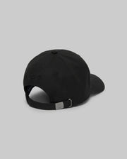 The Psycho Bunny MENS CYRUS BASEBALL CAP - MO1500045 is shown from the back on a gray background, featuring an adjustable metal strap and subtle embroidered text—an ideal way to add understated coastal charm to any outfit.