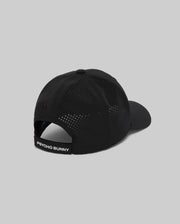 The Psycho Bunny MENS FORREST SPORT CAP (MO1500051) is a black athletic cap with ventilation holes and a sweat-wicking adjustable strap featuring a white "PSYCHO BUNNY" label, shown against a plain gray background.