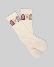 The Psycho Bunny MENS SUNDEW GRAPHIC SPORT SOCK (MO2200020) features cream-colored Pima cotton with colorful bunny graphics and small cartoon bunnies near the top, displayed on a light gray background.