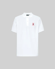The Psycho Bunny MENS MISCHIEF BUNNY PIQUE POLO (MT0100025) is a white Pima cotton short-sleeve shirt with a collar, two mother-of-pearl buttons, and a small red and pink bunny logo on the left chest, shown on a light gray background.