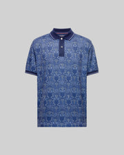 The Psycho Bunny MENS REEVES ALL OVER BUNNY SPORT POLO (MT0100053) features a geometric dark blue bunny print, short sleeves, and dark blue collar and cuffs. Breathable fabric ensures all-day comfort. Shown on a light gray background.