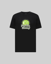 The MENS PETE GRAPHIC TEE - MT0200012 by Psycho Bunny is a black premium Pima cotton tee featuring a green tennis ball with a white bunny silhouette and "Tennis Club Psycho Bunny" on the front, shown against a gray background.