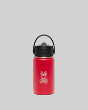The Psycho Bunny KIDS PSYCHO BUNNY WATER BOTTLE - B0A375E200 is a red insulated stainless steel bottle with a black lid and handle, featuring a white cartoon bunny and crossbones design, shown on a plain gray background.
