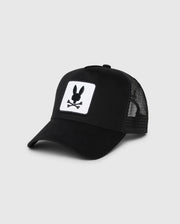 The Psycho Bunny KIDS BUNNY PATCH TRUCKER CAP (B0A965C200) features breathable mesh panels and a front patch with a white bunny logo, including a black bunny head and crossbones.