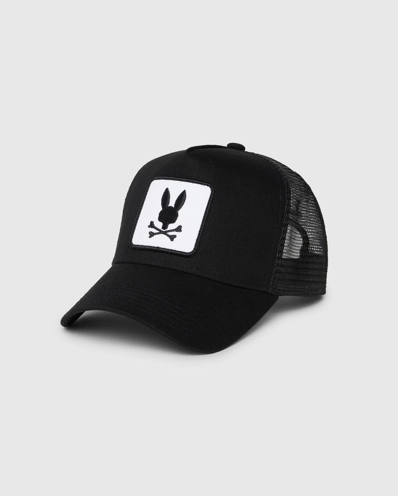 The Psycho Bunny KIDS BUNNY PATCH TRUCKER CAP (B0A965C200) features breathable mesh panels and a front patch with a white bunny logo, including a black bunny head and crossbones.
