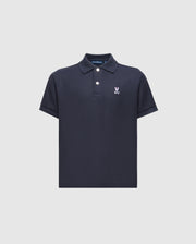 The Psycho Bunny KIDS CLASSIC PIQUE POLO SHIRT (B0K001CRPC) is a navy blue Pima cotton polo featuring short sleeves, a collared neckline with two white buttons, and an embroidered white logo on the left chest, shown against a light background.