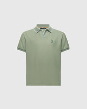 The KIDS EAST HILLS JOHNNY COLLAR POLO - B0K331B200 by Psycho Bunny is a light green, 100% Pima cotton short-sleeve shirt with a Johnny collar featuring white edging and a small embroidered logo on the left chest, exuding a seaside vibe against a plain white background.