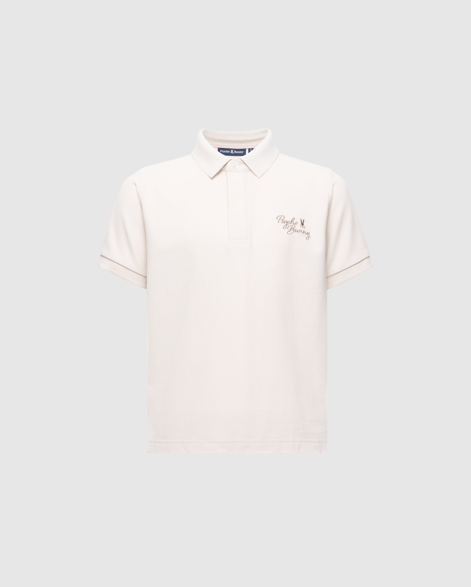 The Psycho Bunny KIDS DESERT PIQUE POLO - B0K506F200 is a classic, gray Pima cotton shirt with a collar, short sleeves, and features an embroidered crown and "Polo Factory" on the left chest for a timeless look.