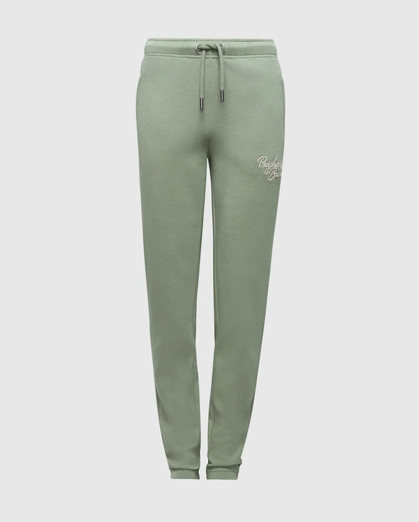 The KIDS DESERT EMBROIDERED MODAL SWEATPANT - B0P489F200 by Psycho Bunny are green joggers made from soft stretch jersey, featuring an elastic waistband and drawstring. These sweatpants have an embroidered wordmark on the left thigh, offering a blend of style and comfort.