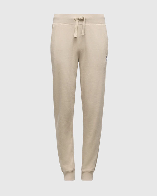 The KIDS LEVY ESSENTIAL FLEECE SWEATPANT - B0P721D200 by Psycho Bunny, in beige, features an adjustable drawstring waistband and ribbed ankle cuffs. Displayed against a plain white background, these joggers perfectly blend comfort and style for kids.