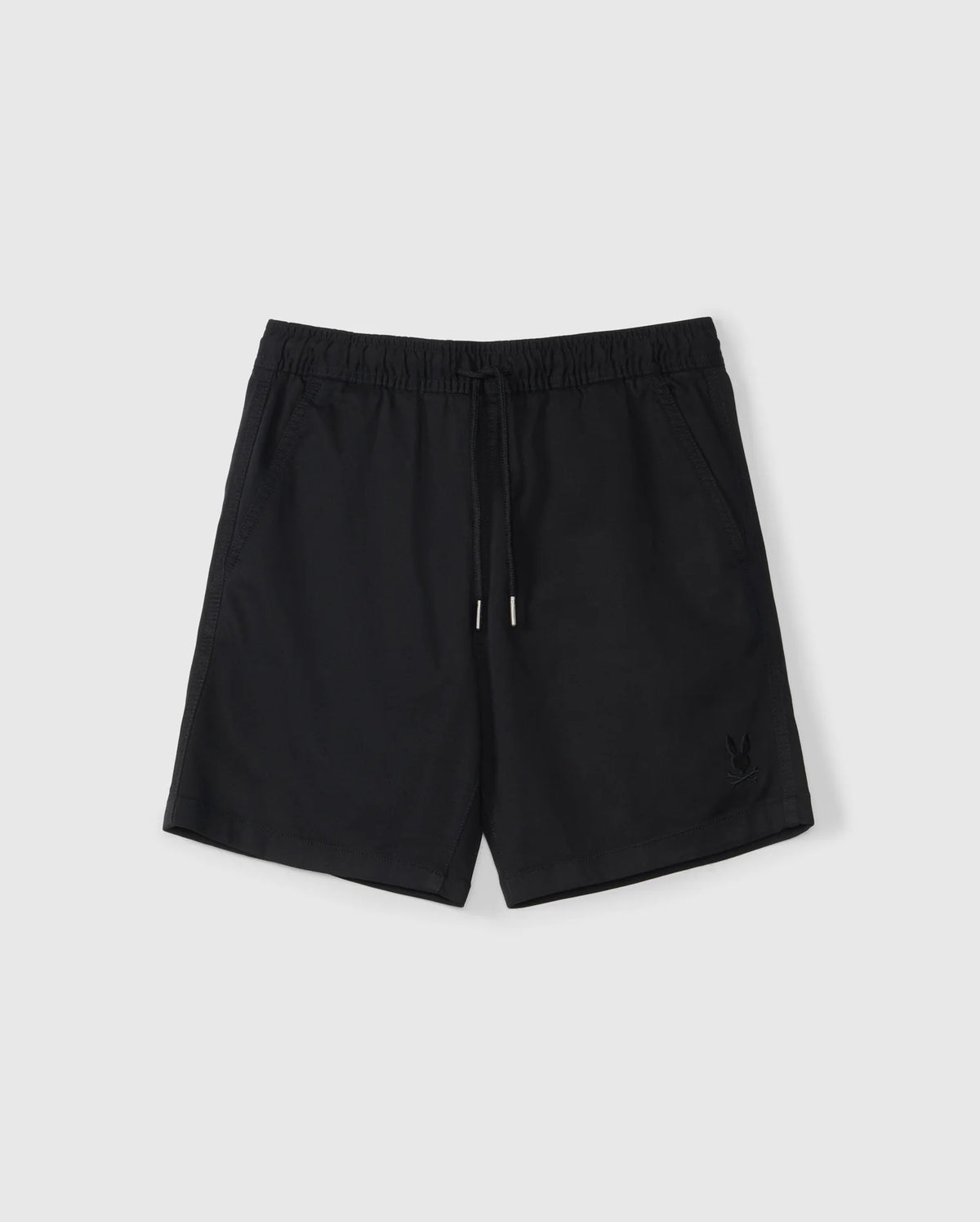The KIDS WILLIS STRETCH TENCEL SHORT - B0R239Y1WB by Psycho Bunny are black athletic shorts with a slim fit, elastic waistband, and drawstring. They feature side pockets and an embroidered bunny logo on the lower left front and are laid flat on a light gray background.