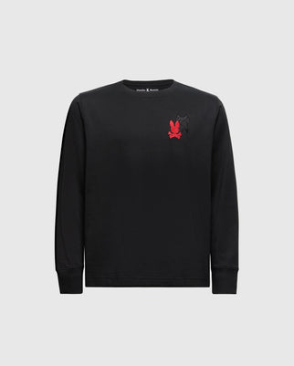 The Psycho Bunny KIDS PIERCE LONG SLEEVE BACK GRAPHIC TEE (B0T178E200) features ribbed cuffs and neckline, crafted from soft Pima cotton. It has a small red and black embroidered bunny design on the chest against a plain light gray background.