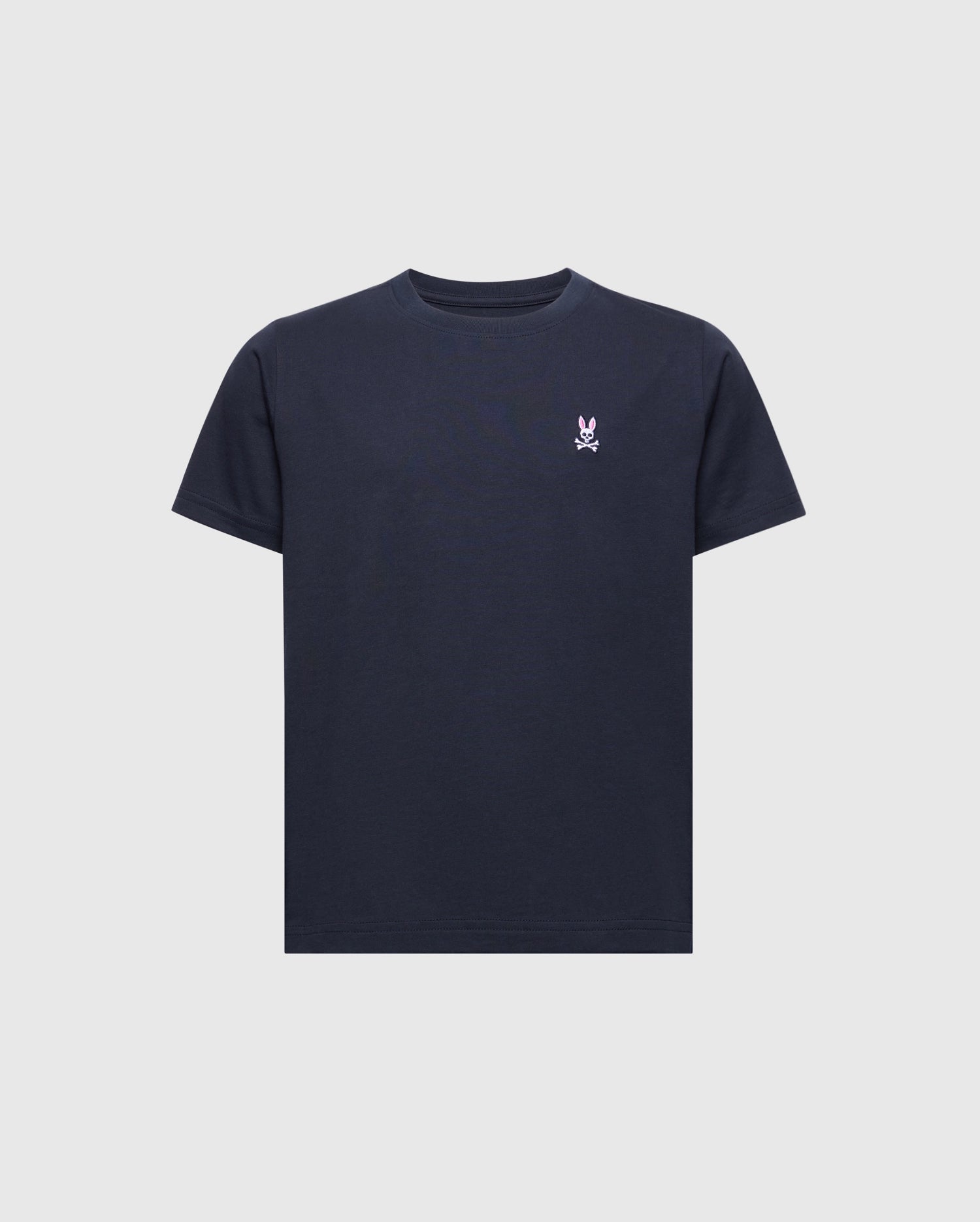 The Psycho Bunny KIDS CLASSIC CREW NECK TEE (B0U014CRPC) is a timeless black shirt made from 100% Pima cotton, featuring a playful embroidered white skull and crossbones with bunny ears on the left chest, all set against a light gray backdrop.