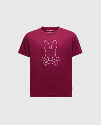 The Psycho Bunny KIDS ALEXANDER GRAPHIC TEE (B0U163E200) is a maroon Pima Cotton shirt with a pink-outlined bunny skull and crossbones logo in the center. Its simple crew neck design offers comfort and bold style for trendy young fashion enthusiasts.