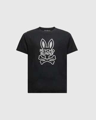 The KIDS DUMON GRAPHIC TEE by Psycho Bunny is a black t-shirt made from soft Pima Cotton. It features a large white graphic of a stylized bunny face with "Psycho Bunny" text and crossed bones, making it an ideal kids' graphic tee.