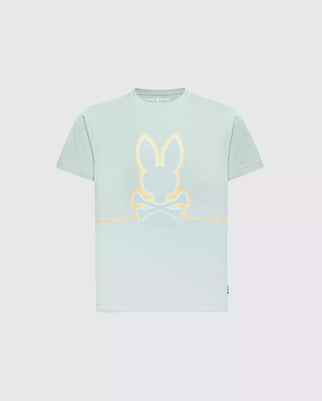 The comfort-oriented KIDS DACANO FRONT GRAPHIC TEE - B0U314E200 by Psycho Bunny has a regular fit in pale green, featuring a prominent stylized yellow bunny head over crossbones graphic at the center.