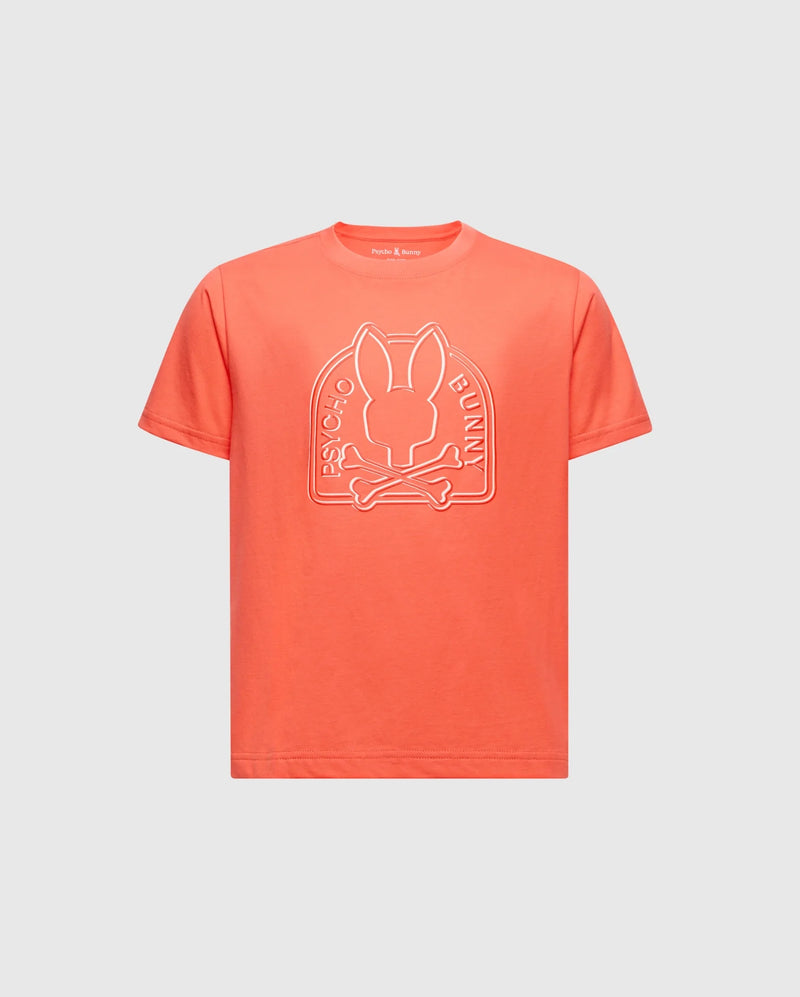 The KIDS MELBOURNE GRAPHIC TEE - B0U410F200 by Psycho Bunny is an orange tee with a white outline bunny and crossed bones graphic. Crafted from luxurious Pima cotton, it features "Psycho Bunny" elegantly around the design, combining style and comfort seamlessly.