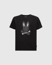 The Psycho Bunny KIDS NEW CASTLE EMBROIDERED GRAPHIC TEE (B0U415F200) is a black tee made from soft Pima cotton, featuring a centered gray and white embroidered bunny head with crossbones.