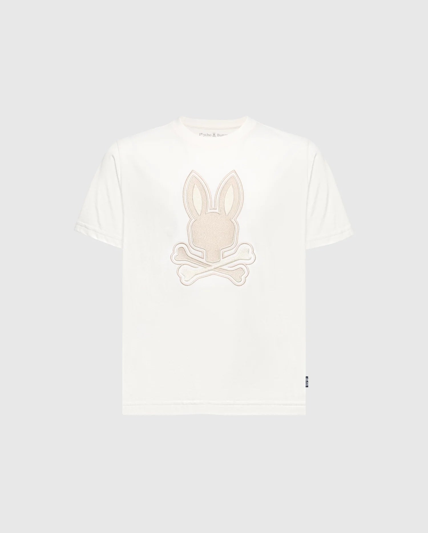 Discover the Psycho Bunny KIDS NEW CASTLE EMBROIDERED GRAPHIC TEE - B0U415F200, a white Pima cotton tee featuring an embroidered long-eared bunny atop crossed bones.