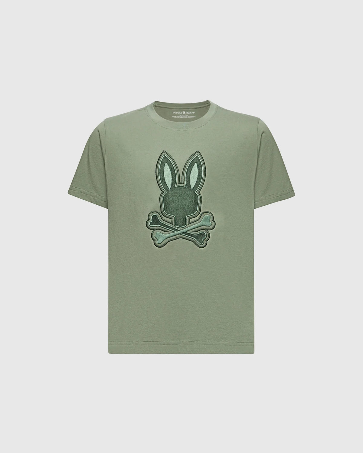The KIDS NEW CASTLE EMBROIDERED GRAPHIC TEE by Psycho Bunny (B0U415F200) features a stylized embroidered bunny head above crossed bones, centrally positioned on the chest against a plain background. Made from Pima cotton.