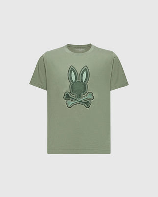 The KIDS NEW CASTLE EMBROIDERED GRAPHIC TEE by Psycho Bunny (B0U415F200) features a stylized embroidered bunny head above crossed bones, centrally positioned on the chest against a plain background. Made from Pima cotton.