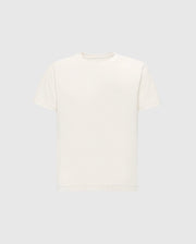 The KIDS TAYLOR PIQUE TEE by Psycho Bunny is an off-white Pima cotton T-shirt featuring a round neck, short sleeves, and an embossed logo on the upper left chest. It is displayed on a light gray background, highlighting its classic style.