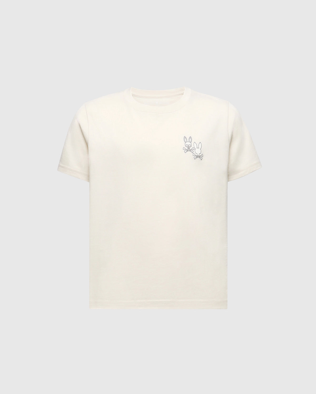 The Psycho Bunny KIDS ELLIOT FRONT BACK GRAPHIC TEE (B0U605F200) is a light beige Pima cotton shirt featuring an eco-friendly water-based print of a simple cartoon rabbit line drawing on the upper left, set against a plain grey background.