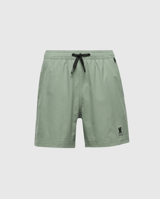 Psycho Bunny's KIDS SAMOS HYDROCHROMIC PRINTED SWIM TRUNK in sage green, featuring a black drawstring and logo, reveals hidden patterns when wet. Inspired by the Samos design, its elastic waistband ensures comfort. Product Code: B0W453F200.