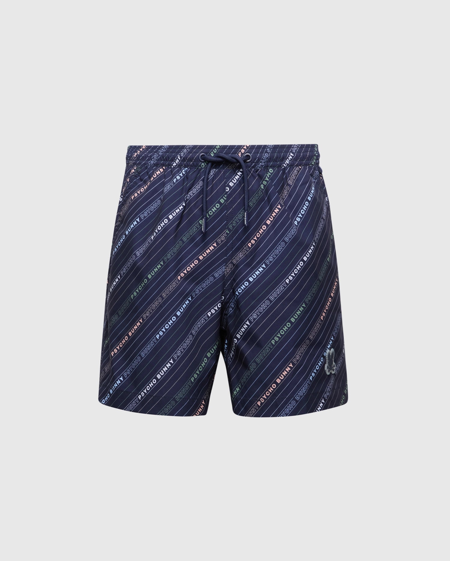 The KIDS RENMARK PB PRINTED SWIM TRUNK - B0W622F200 by Psycho Bunny, in navy blue, features diagonal multicolored stripes with repetitive text and an allover logo-patterned print. It includes a drawstring waist and a small logo on the lower left.