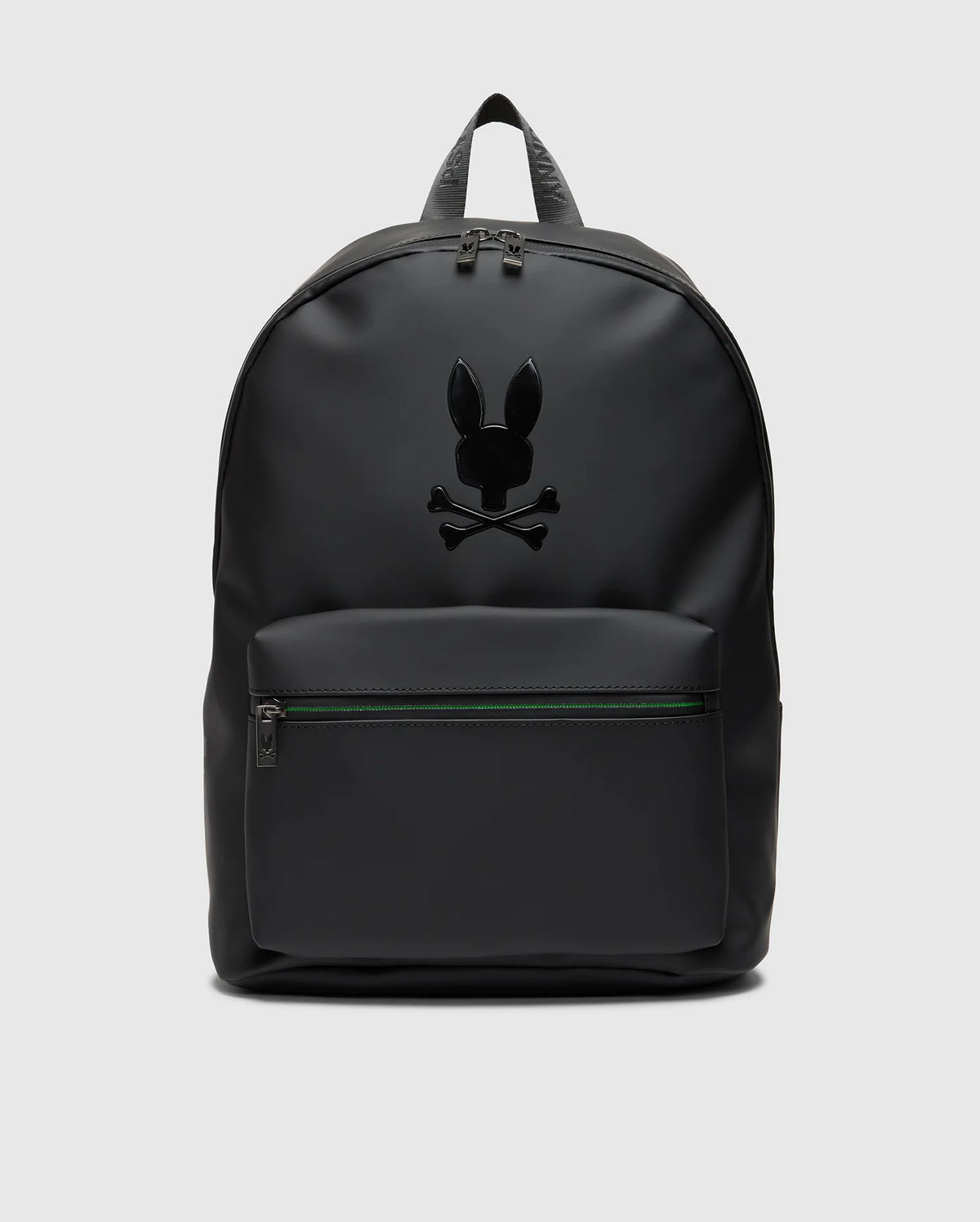 The MENS RUBBERIZED BACKPACK - B6A637F200 by Psycho Bunny is a sleek black bag featuring durability, functionality, and a front pocket with top zipper. Adorned with a distinctive rabbit head and crossbones design, it includes a top handle and adjustable shoulder straps for daily adventures.