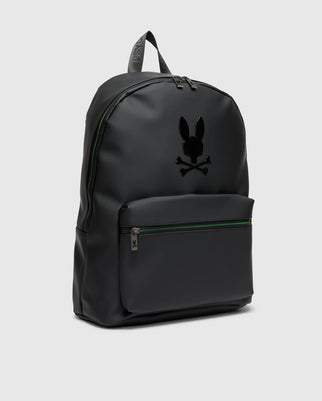 The MENS RUBBERIZED BACKPACK - B6A637F200 from Psycho Bunny is sleek with a subtle gloss finish, offering both functionality and durability. It includes a front zipper pocket and spacious top pocket. The minimalist bunny with crossbones logo adds an edgy touch to its design.