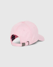 The MENS CLASSIC BASEBALL CAP - B6A816A1HT by Psycho Bunny is showcased from the back, highlighting its light pink hue crafted from six-panel cotton twill. This classic design includes an adjustable strap with a metal buckle for personalized fit. The inner lining near the strap is in a darker shade, offering a striking contrast to the pastel pink fabric and featuring an embroidered Bunny logo.