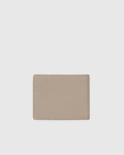 A Psycho Bunny MENS LEATHER WALLET - B6A868D200 in minimalist beige rests against a light gray backdrop. The closed wallet highlights its smooth, unadorned surface and precise stitching, exemplifying premium craftsmanship.