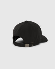 A MENS JAMES PREMIUM BASEBALL CAP - B6A953D200 from Psycho Bunny is displayed from the back, showcasing an adjustable strap with a metal buckle. Made of a subtly textured polyester spandex fabric, the cap includes a curved brim and features an embroidered Psycho Bunny logo that adds a playful element against its light gray background.
