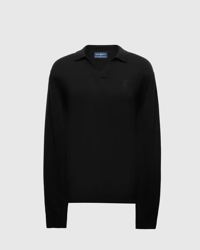 The Psycho Bunny MENS JOHNNY COLLAR SWEATER (B6E258E200) is a black, long-sleeve men's sweater boasting a stylish Johnny collar and subtle chest emblem, made from soft cotton-wool blend. Displayed on a plain gray background.