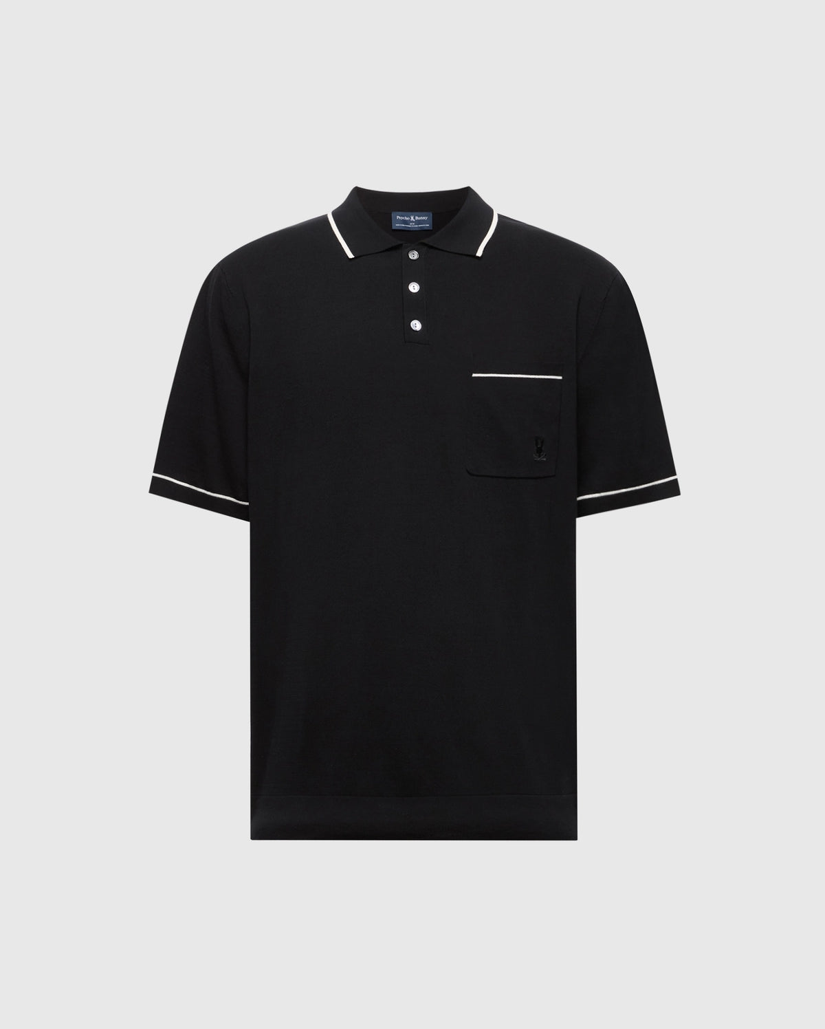 The Psycho Bunny MENS LONGFORD FINE KNIT POLO (B6E500F200) is a black, short-sleeve cotton shirt with a collar, three white buttons, white piping, and a Bunny-embroidered chest pocket. Displayed on a plain light background.