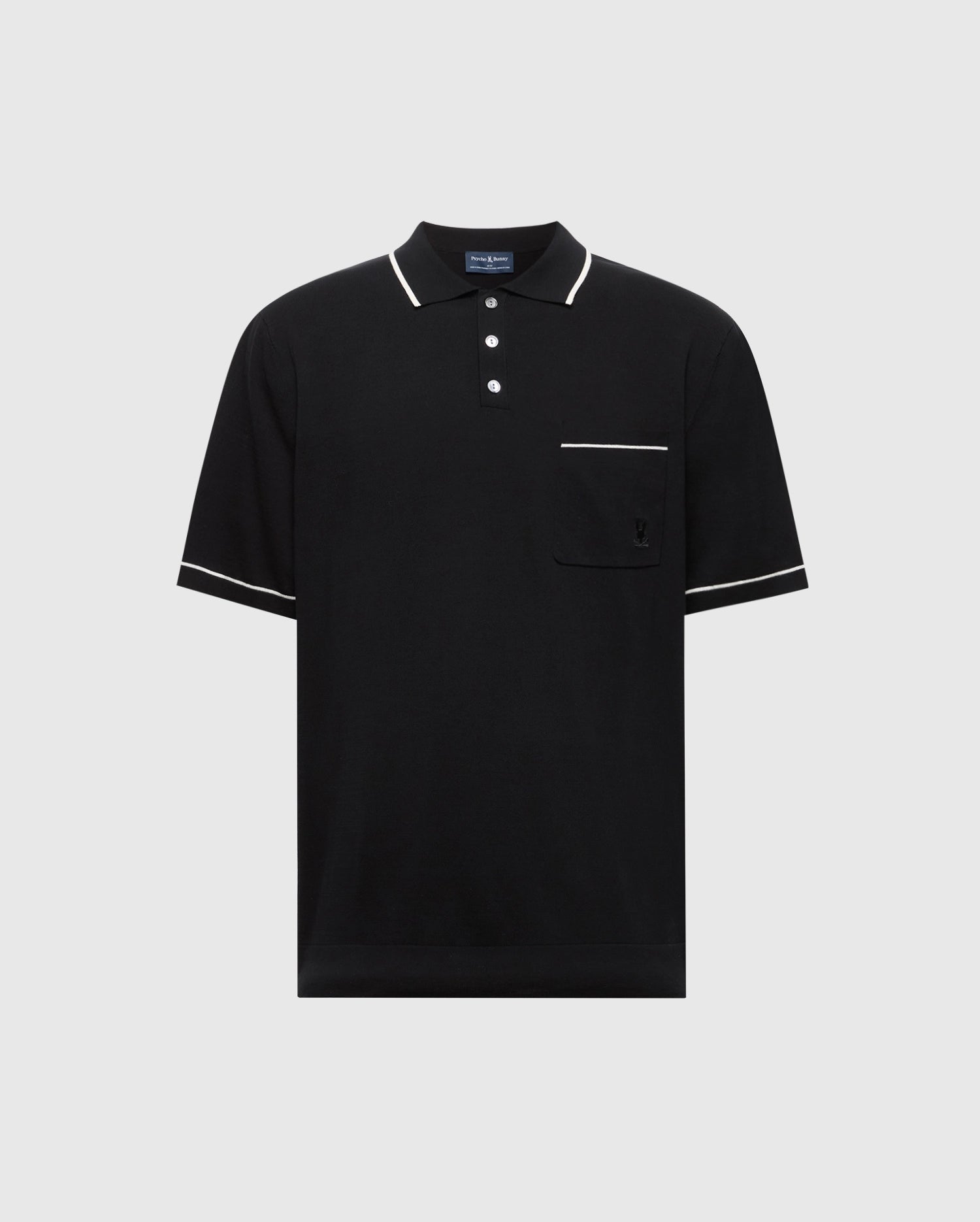 The Psycho Bunny MENS LONGFORD FINE KNIT POLO (B6E500F200) is a black, short-sleeve cotton shirt with a collar, three white buttons, white piping, and a Bunny-embroidered chest pocket. Displayed on a plain light background.