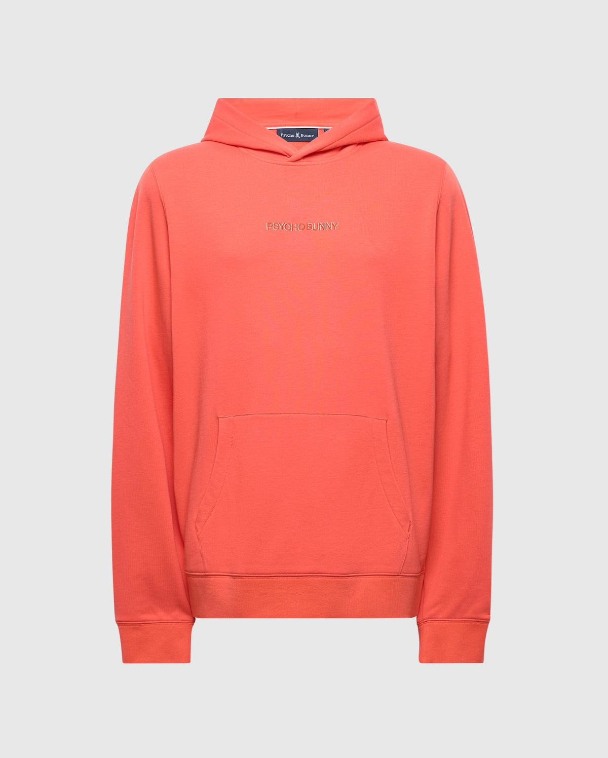 The Men's Nora Classic French Terry Hoodie by Psycho Bunny is a soft coral garment featuring a chest wordmark embroidery, front pocket, long sleeves, and a relaxed fit.