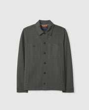 The MENS BEDFORD SHIRT JACKET B6J290B200 by Psycho Bunny is a dark green cotton-blend button-up with a collar and two chest pockets, adding an urban feel to any outfit against a plain white background.