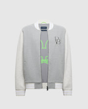 The Psycho Bunny MENS HYDRA COLOR BLOCK KNIT BOMBER (B6J455F200) is a gray and white bomber jacket crafted from a premium cotton blend. It features striped ribbed cuffs, collar, an embroidered Bunny logo on the chest, and reveals a gray top with neon green accents when unzipped.
